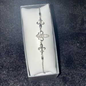 Elegant Silver Bracelet with Charms